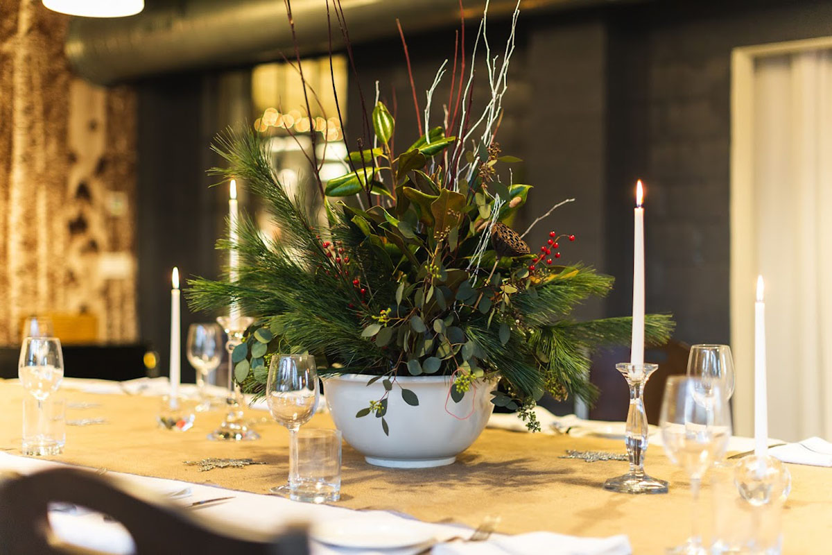 Table setting with a decorative plant vase 