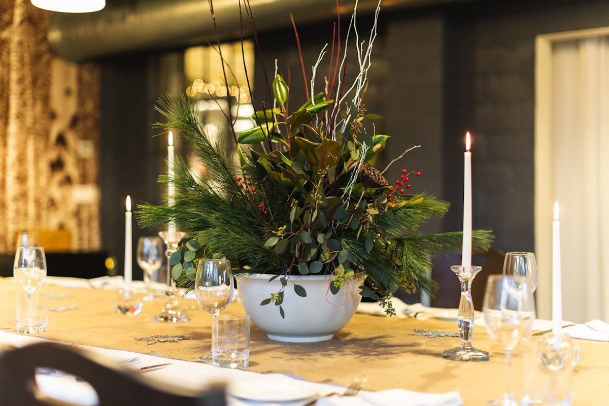 Table setting with a decorative plant vase
