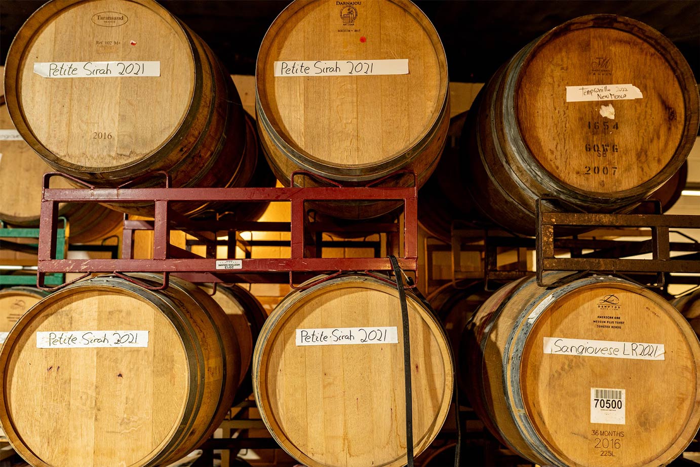 Barrel racks inside a wine cellar