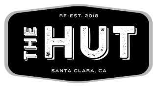 The Hut logo scroll