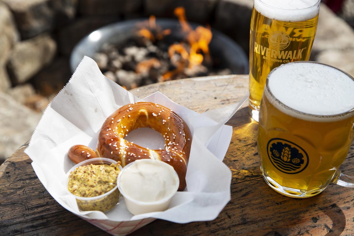 Pretzels served with dip and beer