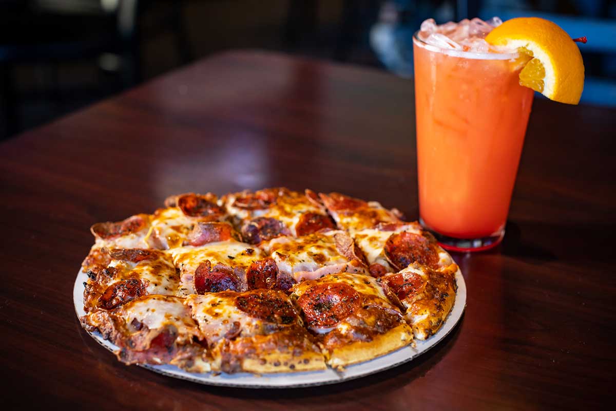 Meat Lovers pizza and Bahama Mama cocktail