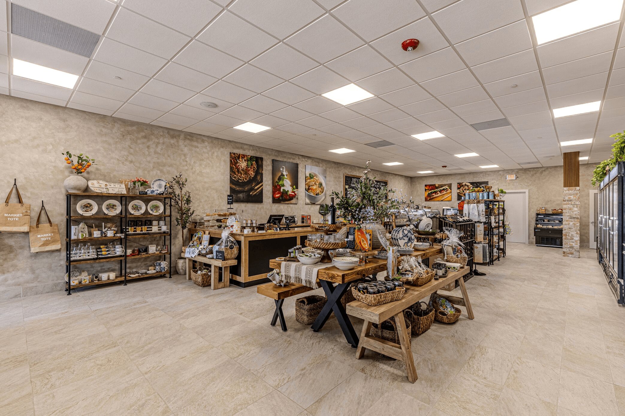Wide view of the market with wooden display tables
