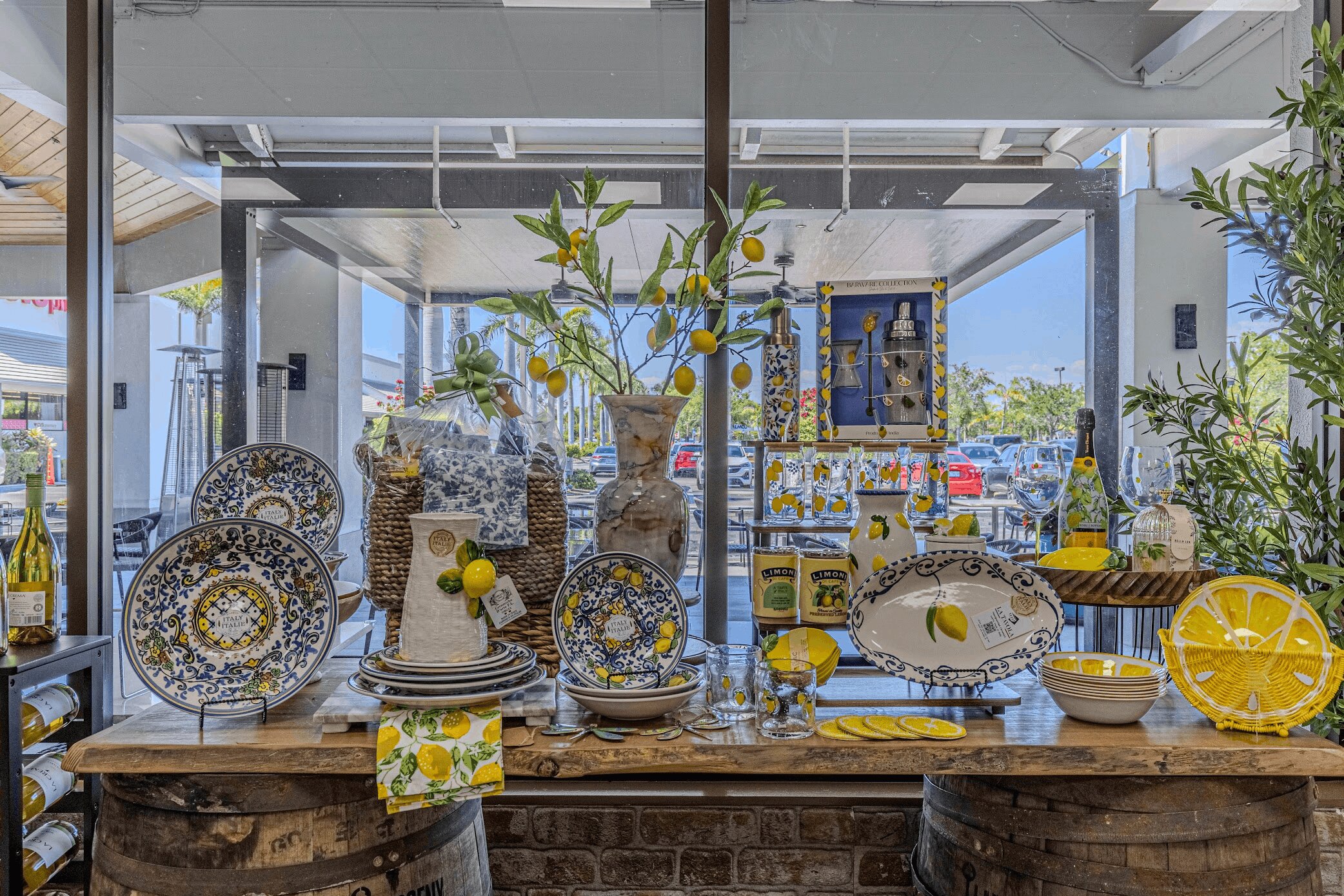 Display table with lemon-themed ceramics and decorative platters