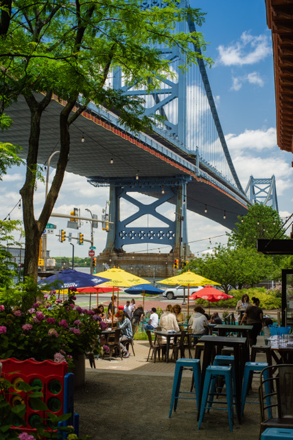 Outdoor seating with a view of the bridge