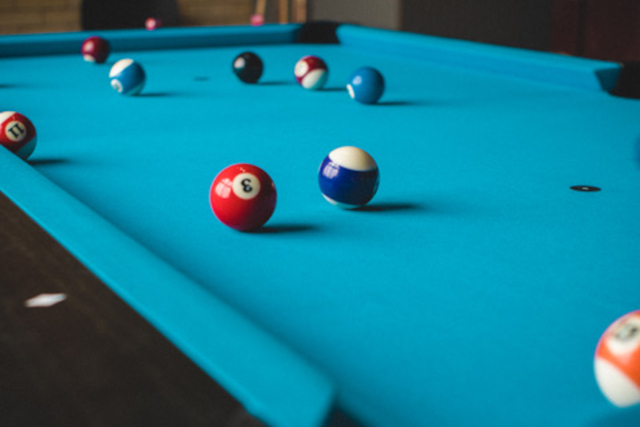a pool table with balls on it