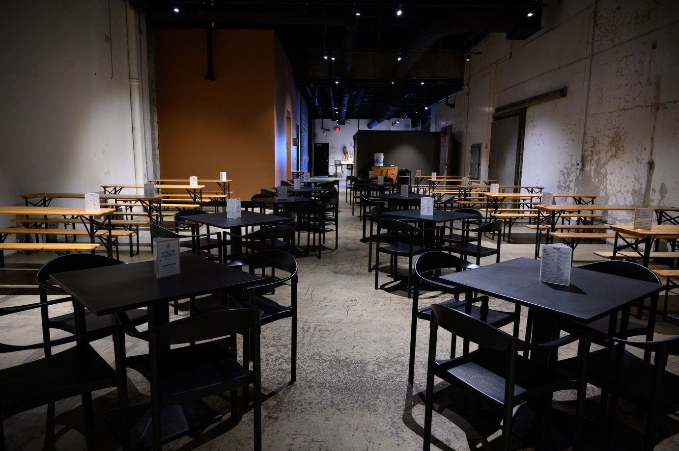 A quiet combo room, displaying tables and chairs in an empty setting