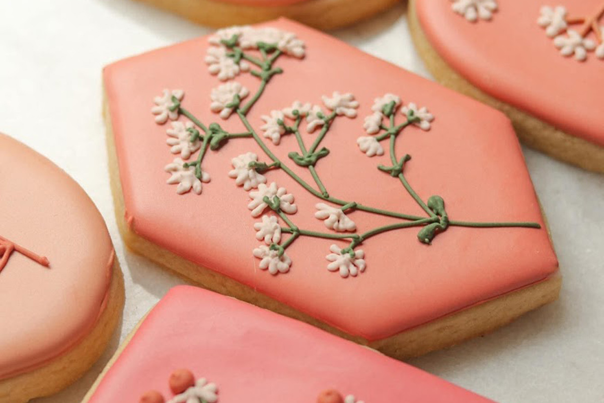 Pink sugar cookies of different shapes and designs