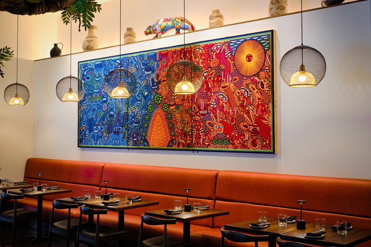 Interior, dining area, large painting on the wall