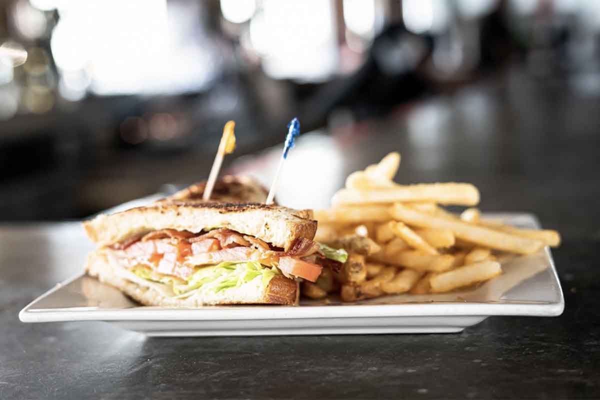 Grilled chicken and BLT sandwich, with fries