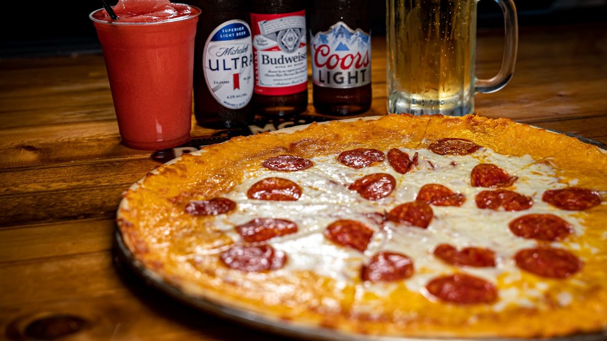 Pizza with assorted beers