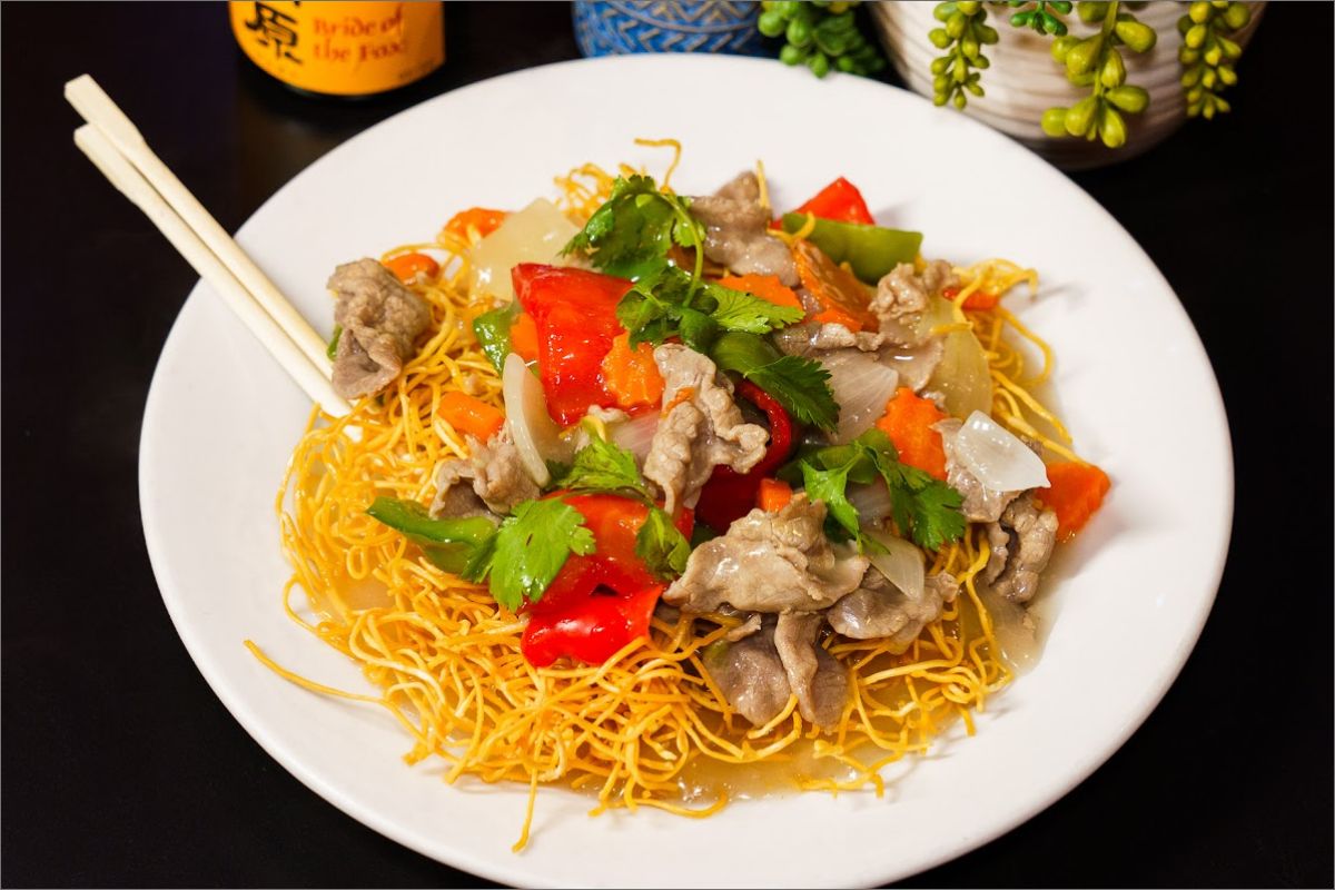 Stir fried noodles, with beef, cilantro, and vegetables