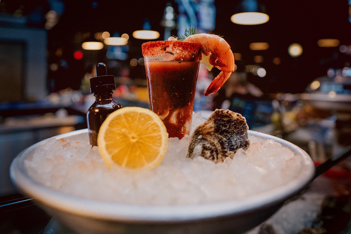 A seafood cocktail served in a glass on a bed of ice