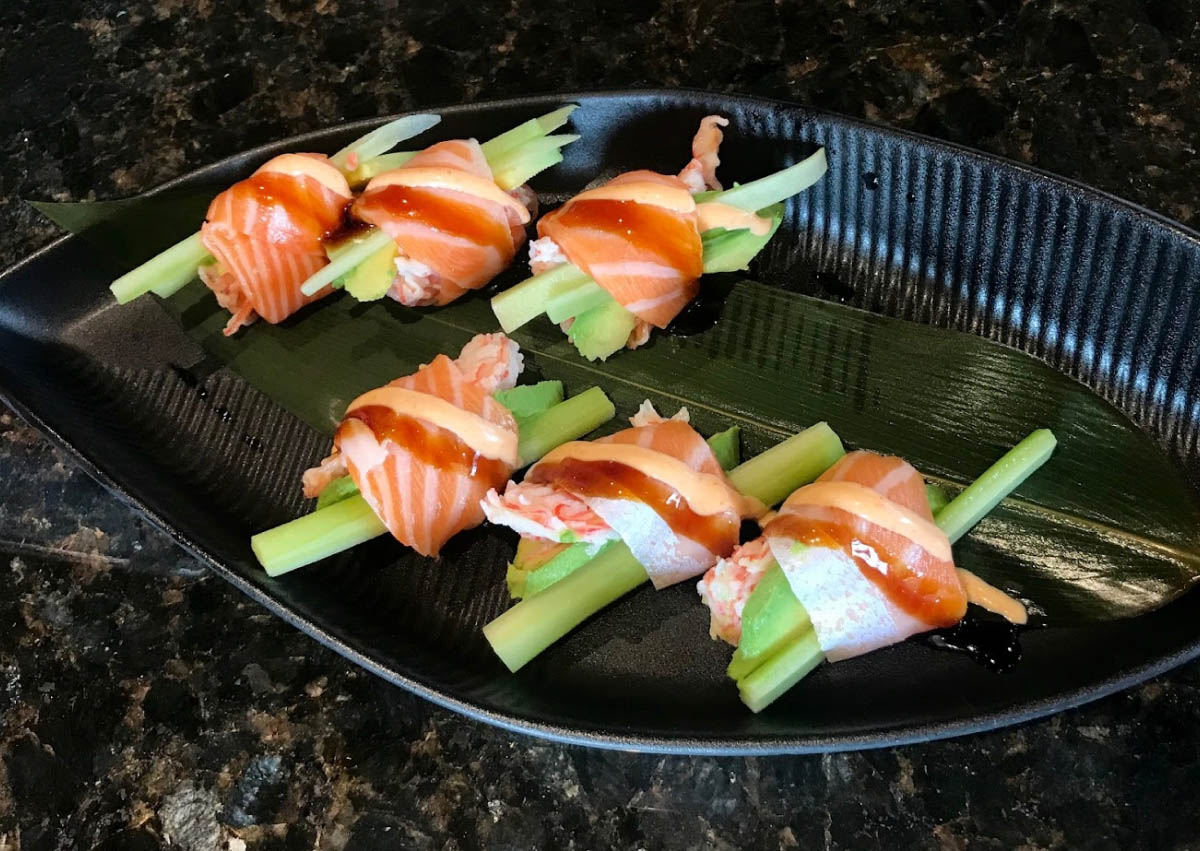 Sushi rolls, with salmon wrap and celery
