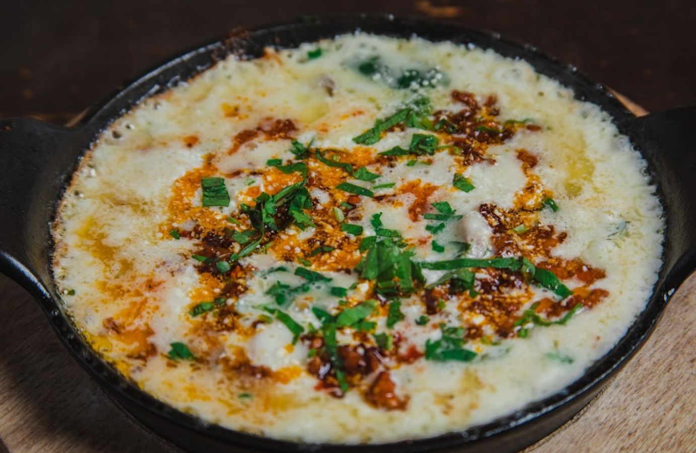 QUESO FUNDIDO close up side view
