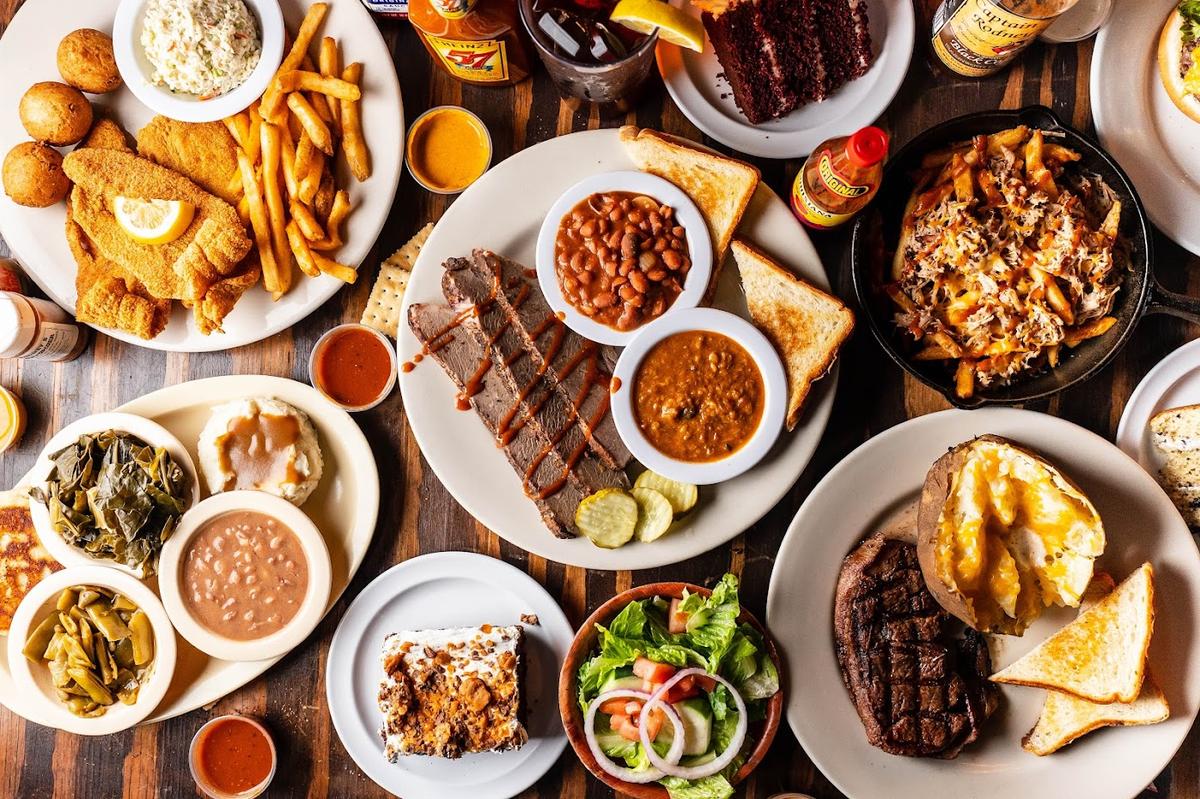 Multiple plates with various food, top view