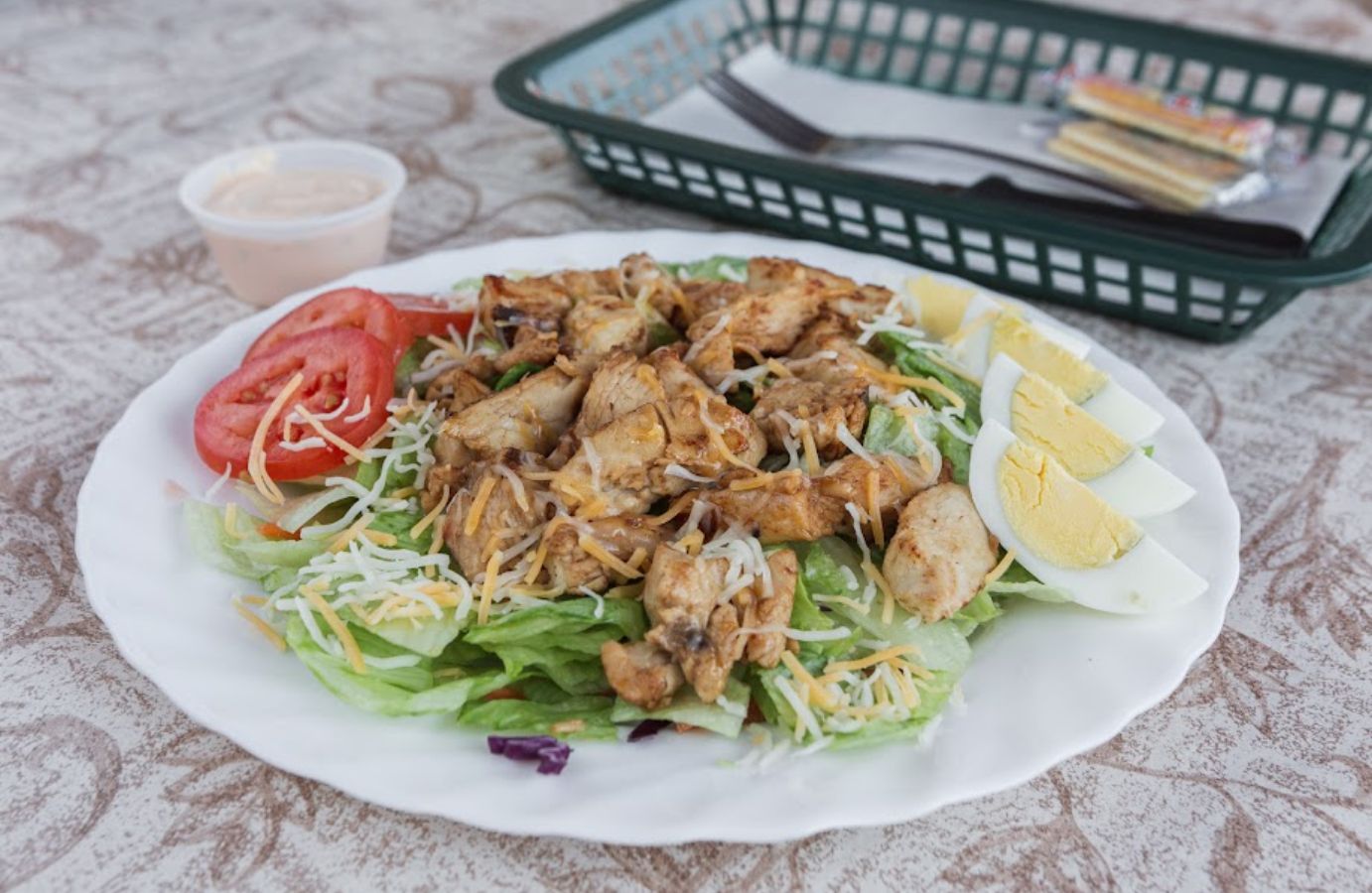 Grilled Chicken Salad on a table side view