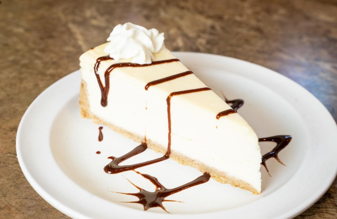 cheesecake with chocolate topping side view