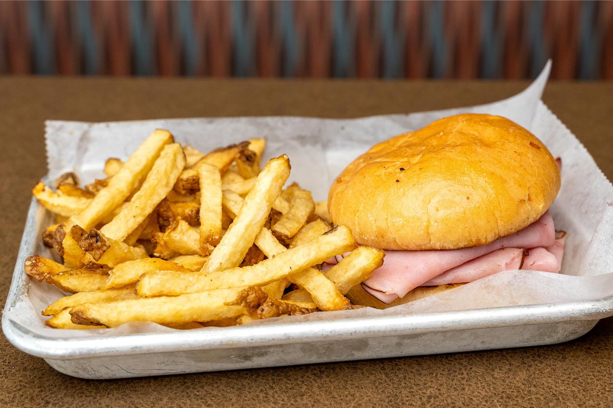 Ham sandwich with fries