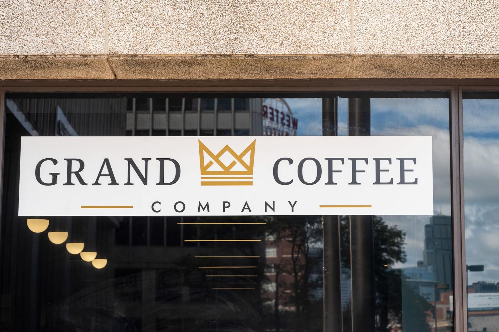 Grand coffee logo on the glass