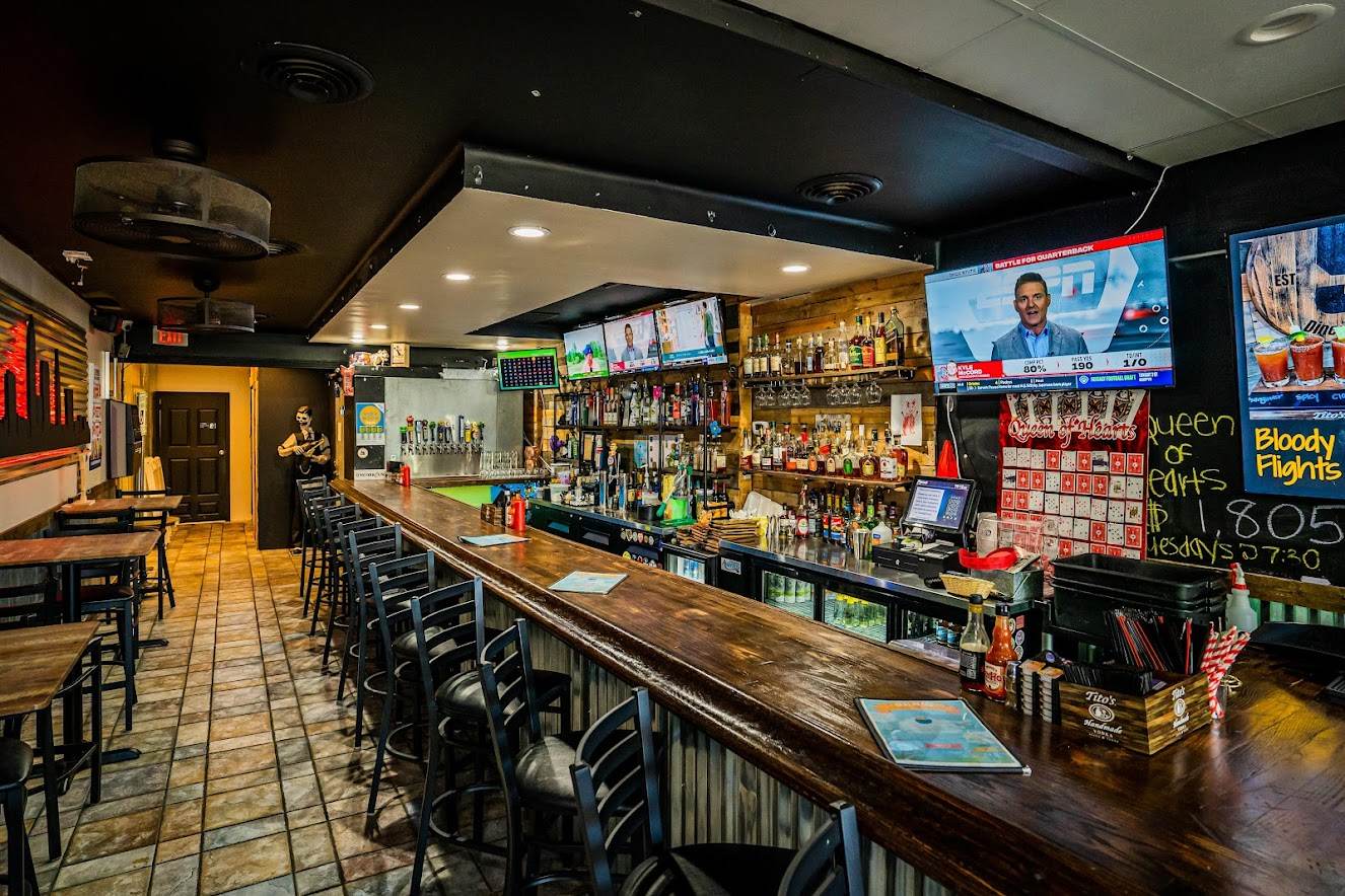 bar interior with large-screen TVs