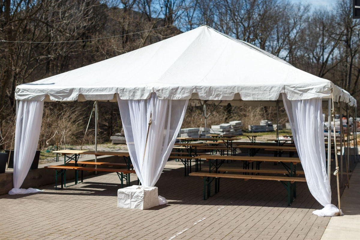 Tent set up with tables and chairs