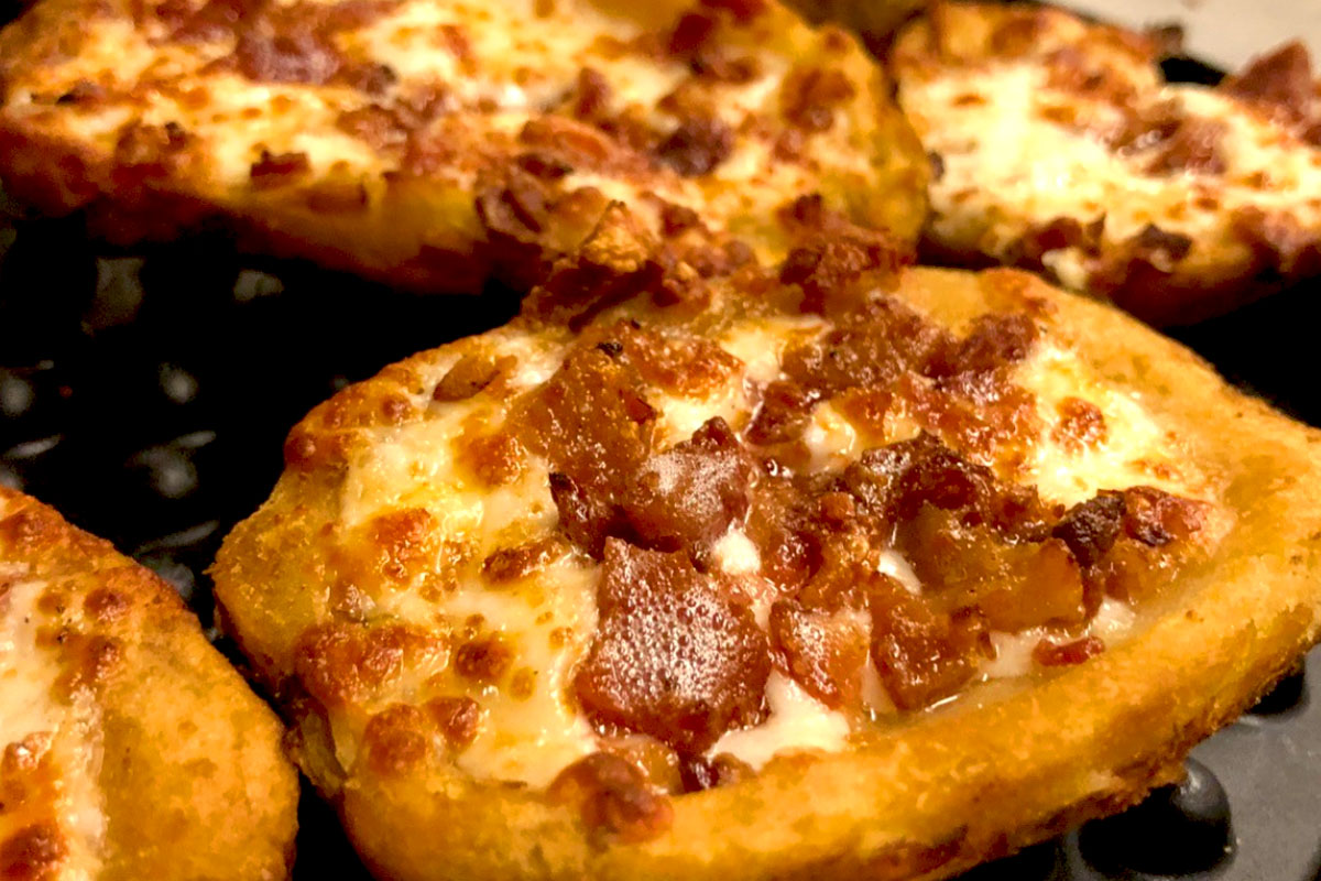 Potato skins, with melted cheese, and bacon