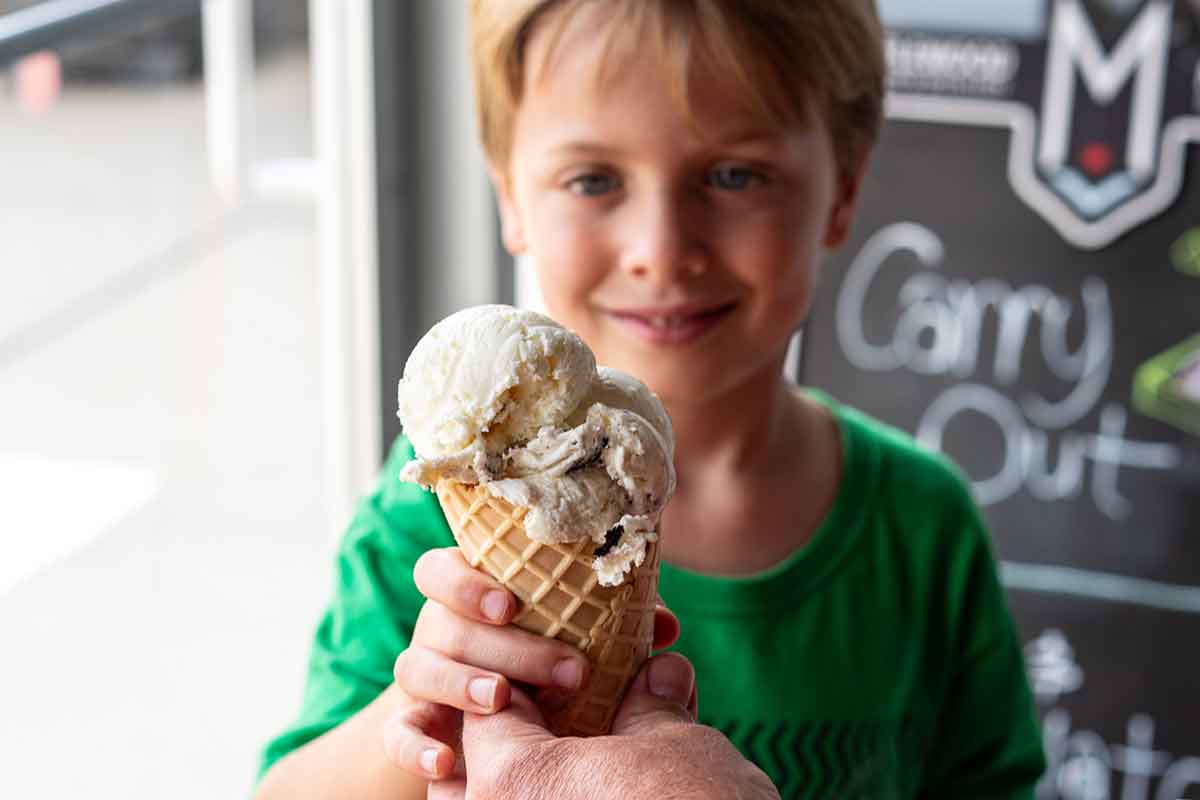 A kid having ice cream