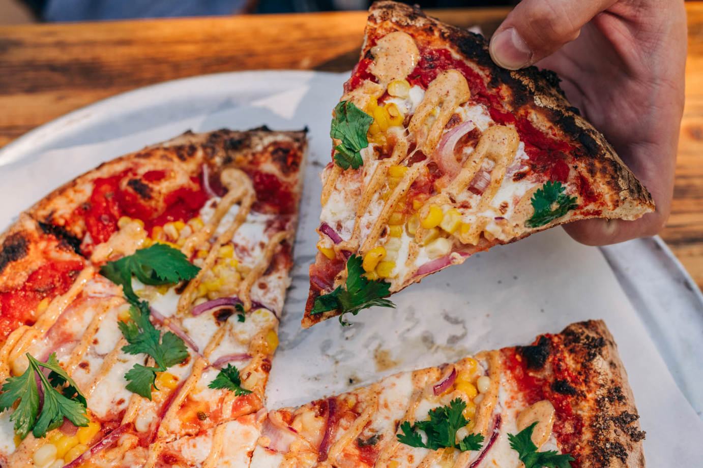 Pizza slices with corn