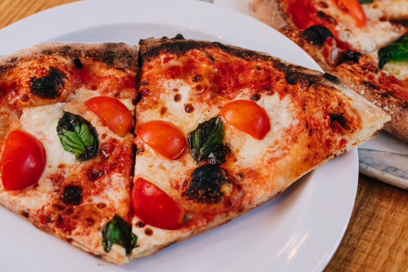 Pizza slices with cherry tomato