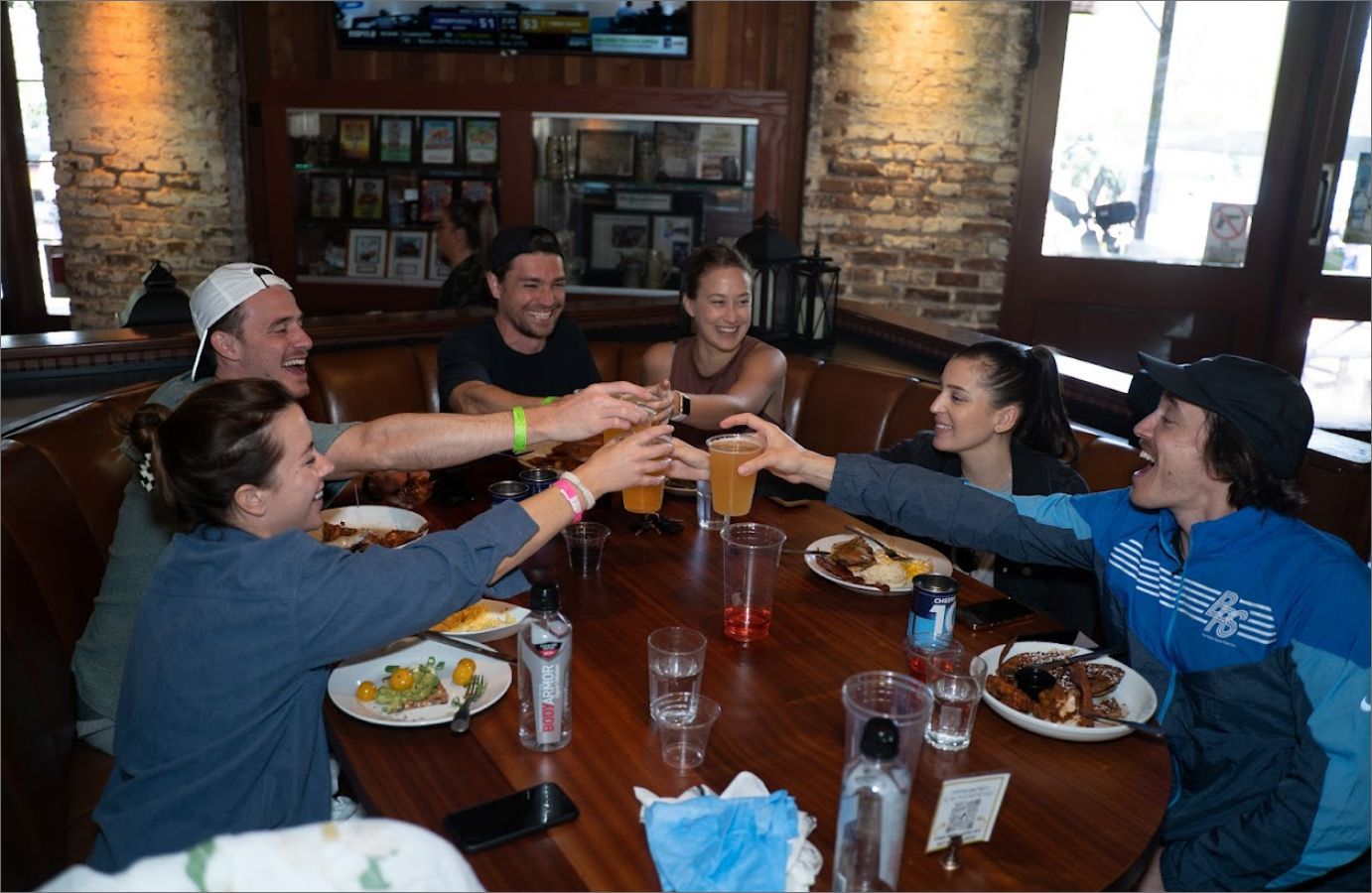 Customers toasting at the table