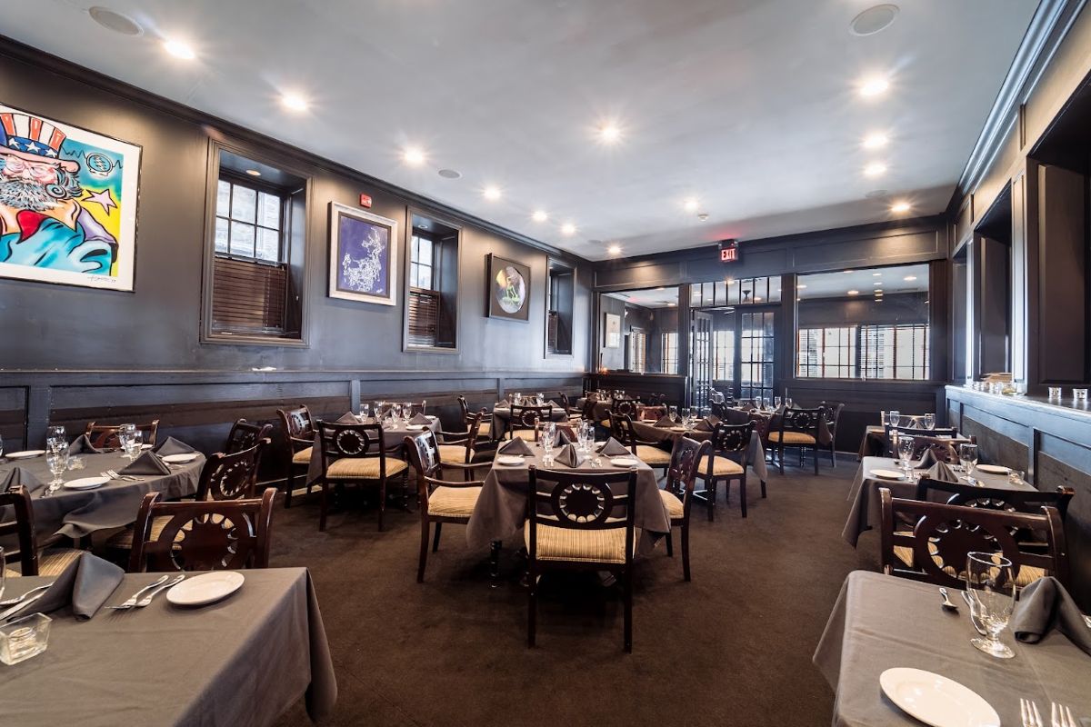 Full view of the dining room set for a group event