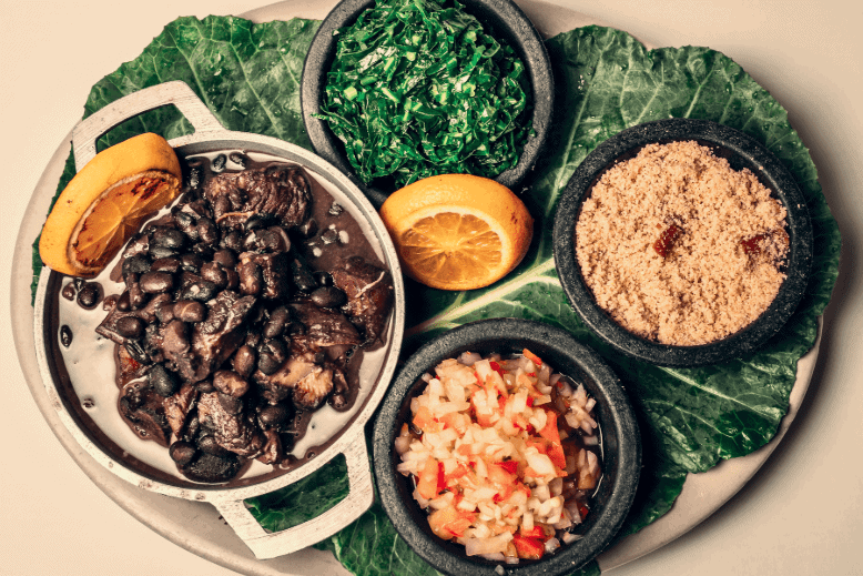 Dinner entrees, with two sides, feijoada stew