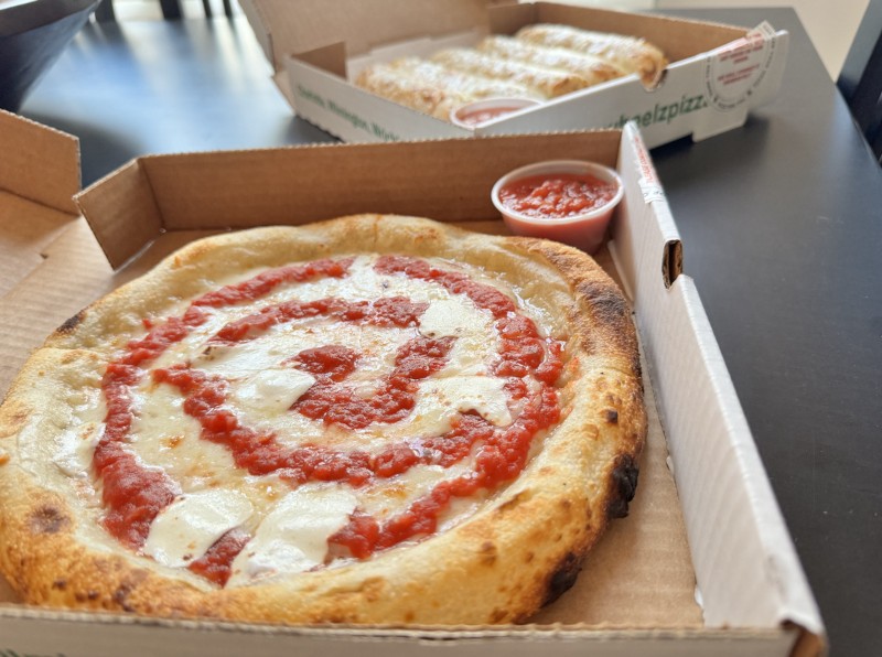 Wheelz Pizza’s three-cheese pizza and cheesy garlic parmesan breadsticks