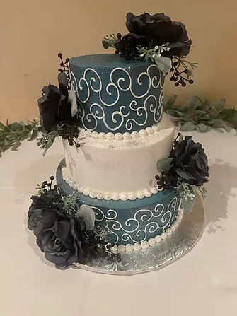 Green and Blue wedding cake with black flowers