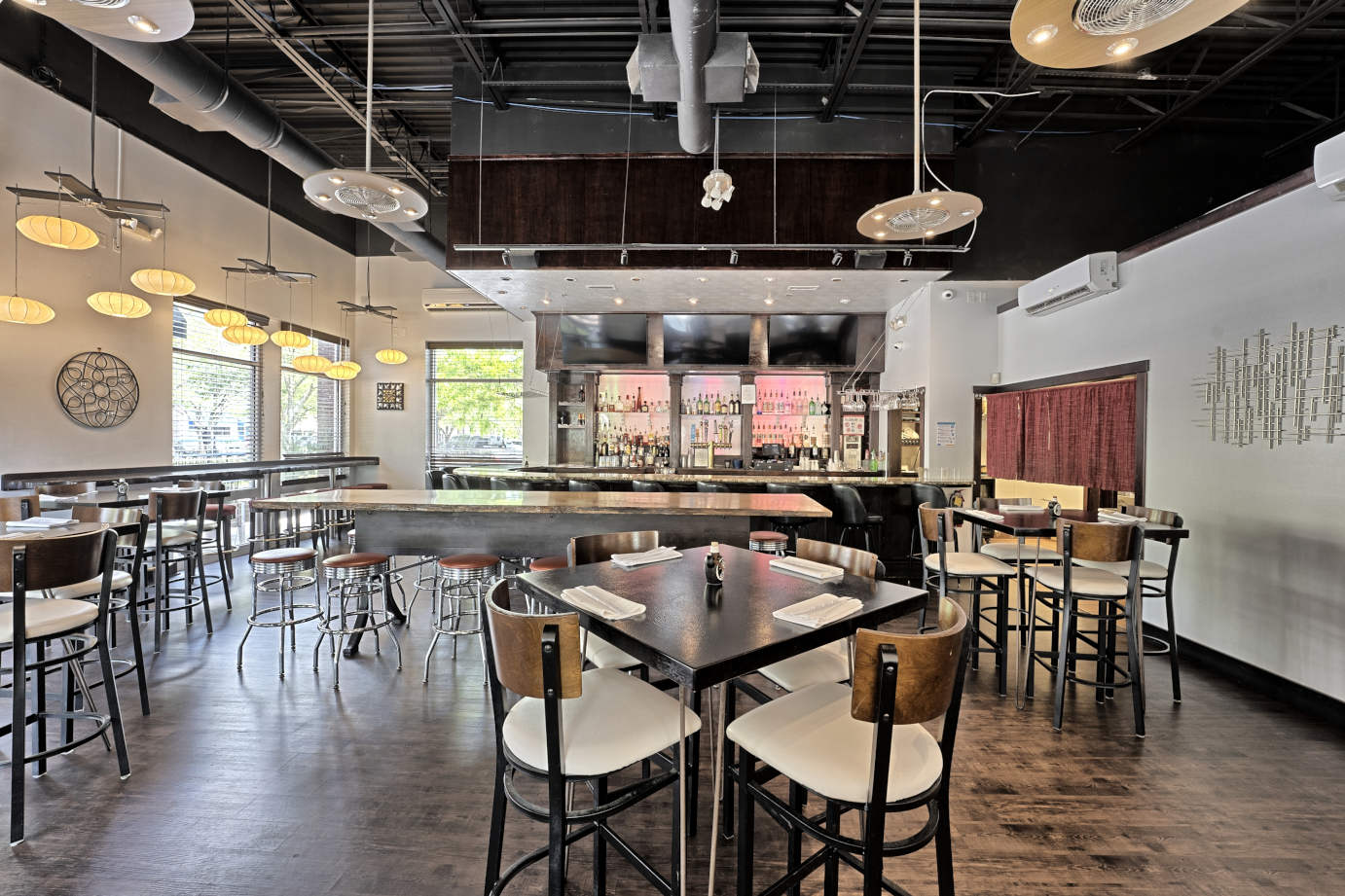 Interior, tables and seating around the bar area