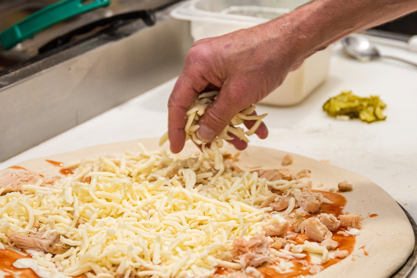 chef preparing pizza