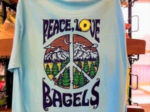 T-Shirt with a 'Peace, Love, Bagels' writing