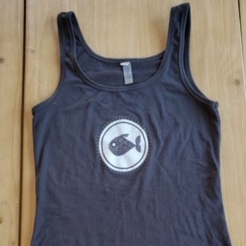 A gray tank top with a fish on it.