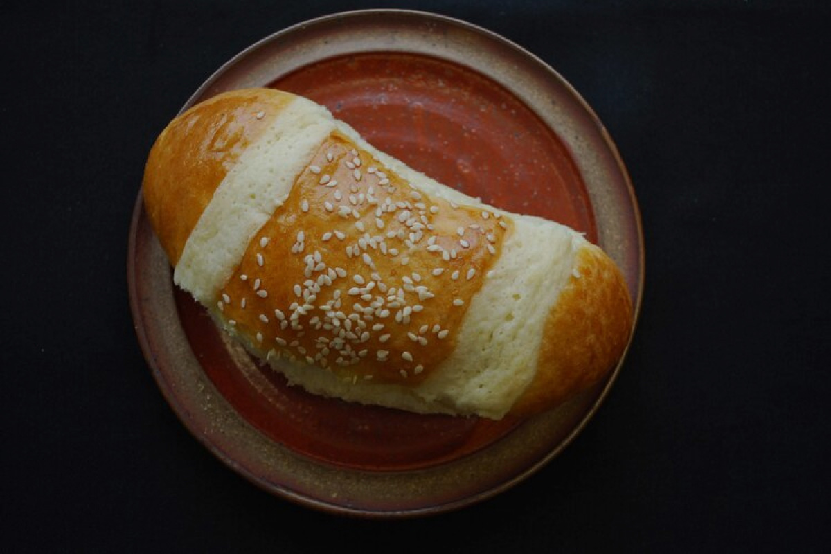 a roll on a plate