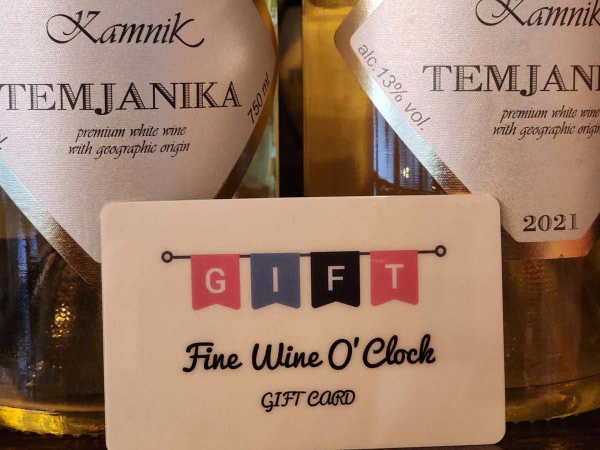 a gift card with a label on bottles