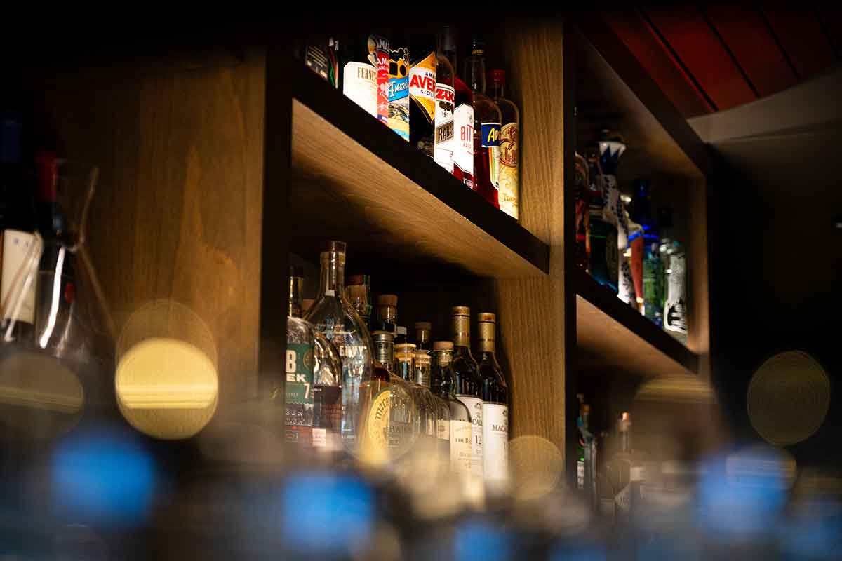 Various liquor bottles on the shelf