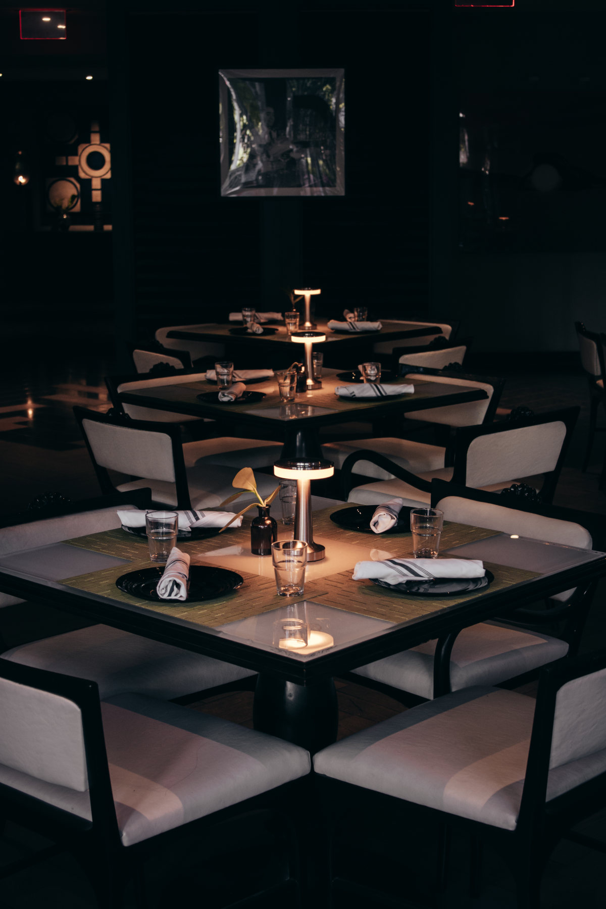 A table covered with a white cloth, creating a clean and elegant look.