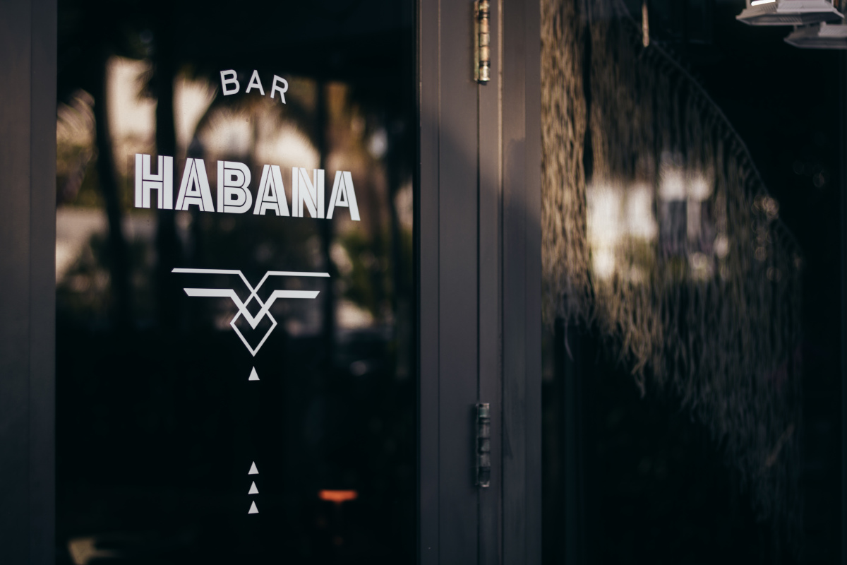 Exterior of Bar Habana in Miami, showcasing vibrant Cuban decor and lively atmosphere