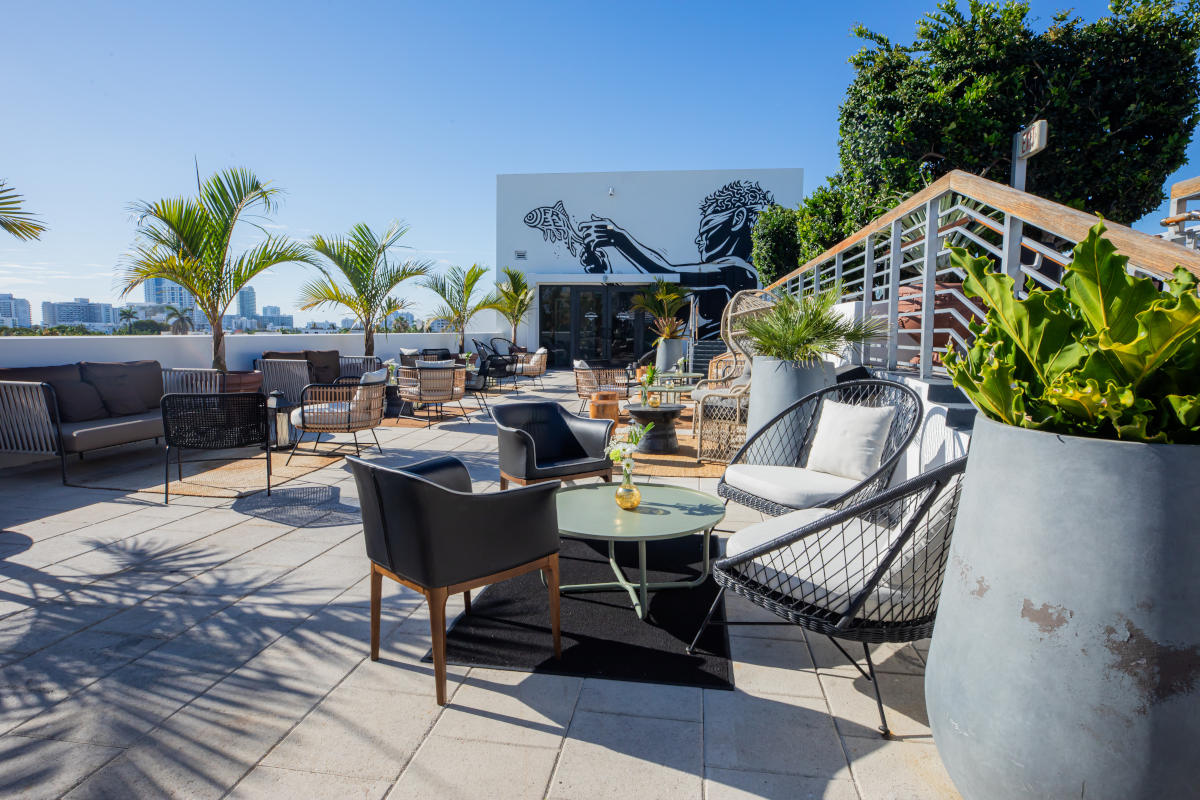 Relaxing rooftop patio at the hotel, ideal for taking a break and soaking up the sun.