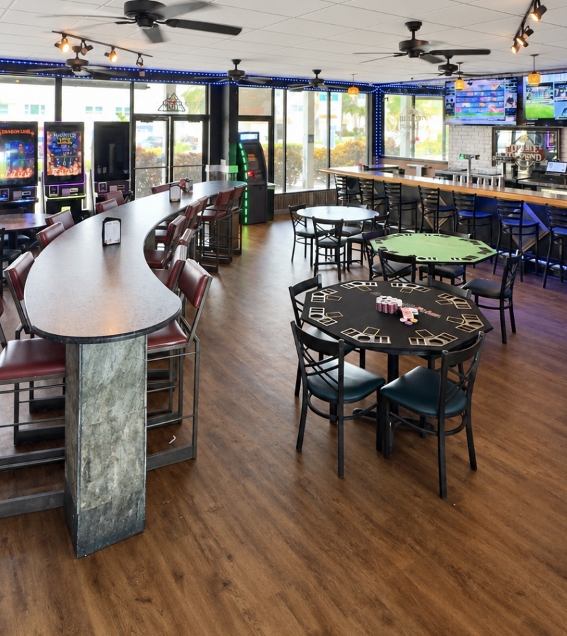 The Social Club main room with poker tables, bar seating and gaming machines