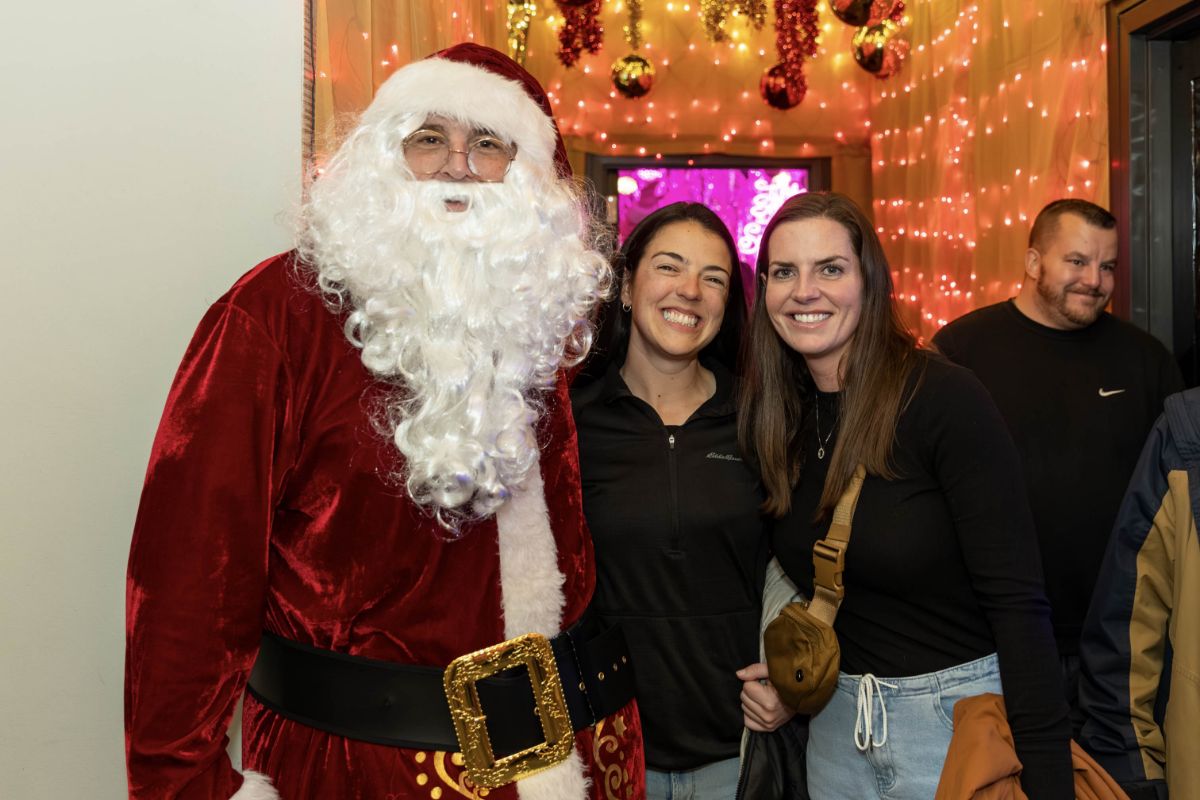 Santa Claus posing with guests