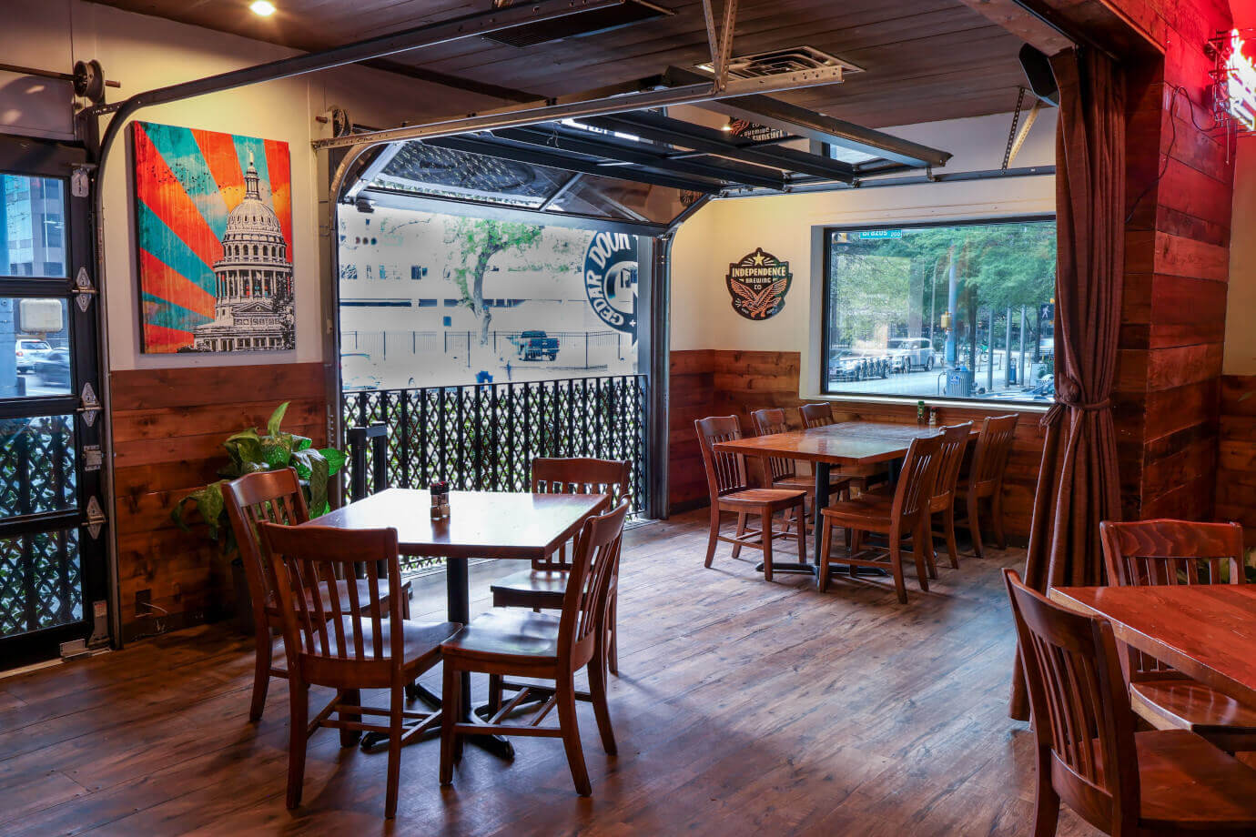 a dining room table in front of a window