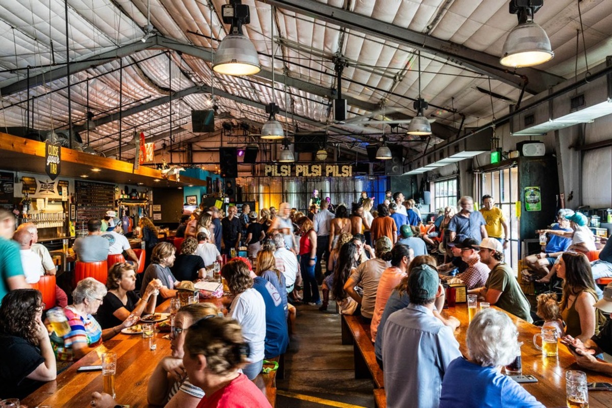 Guests filling the main beer hall bar.