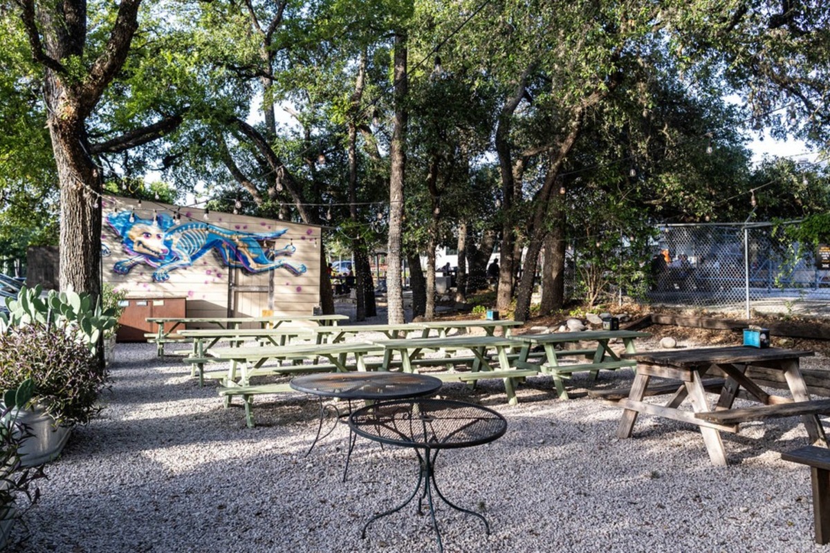 Outdoor seating and games area in the beer garden.